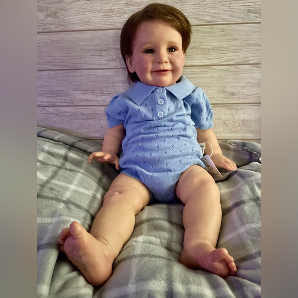Beautiful Collectible Weighted Baby Doll with Adorable Blue Outfit